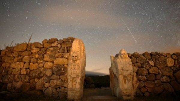 A meteor is seen in front of the Sphinx Door at the ancient city of Hattusa, in Corum, Turkey