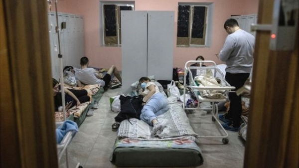 Women rest in the bomb shelter of a maternity hospital in Kyiv, 2 March 2022